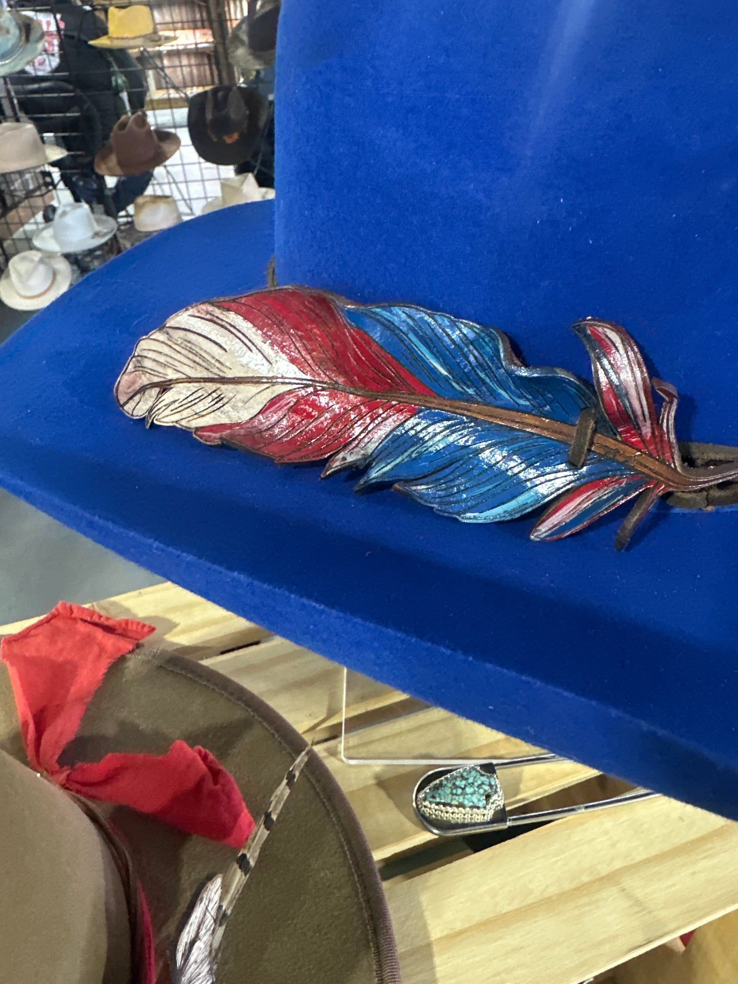 Royal blue Gone Country with hand painted feather hatband