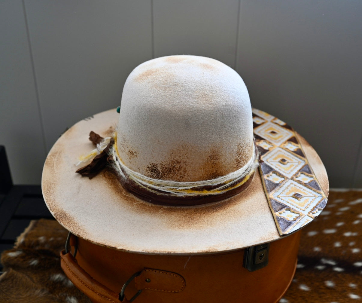 Open crown felt with custom western trip and turquoise brand