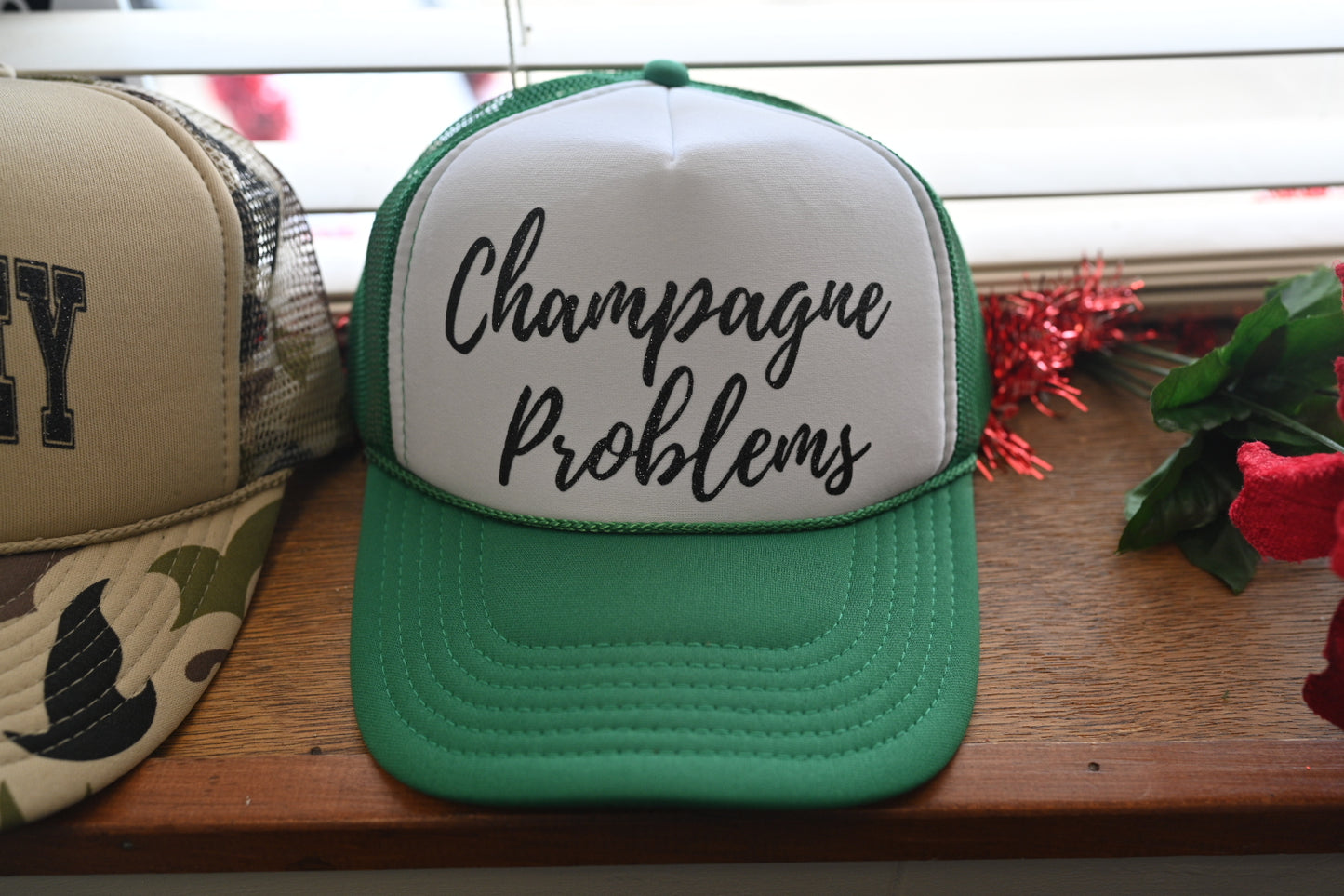 Champagne Problems trucker hat