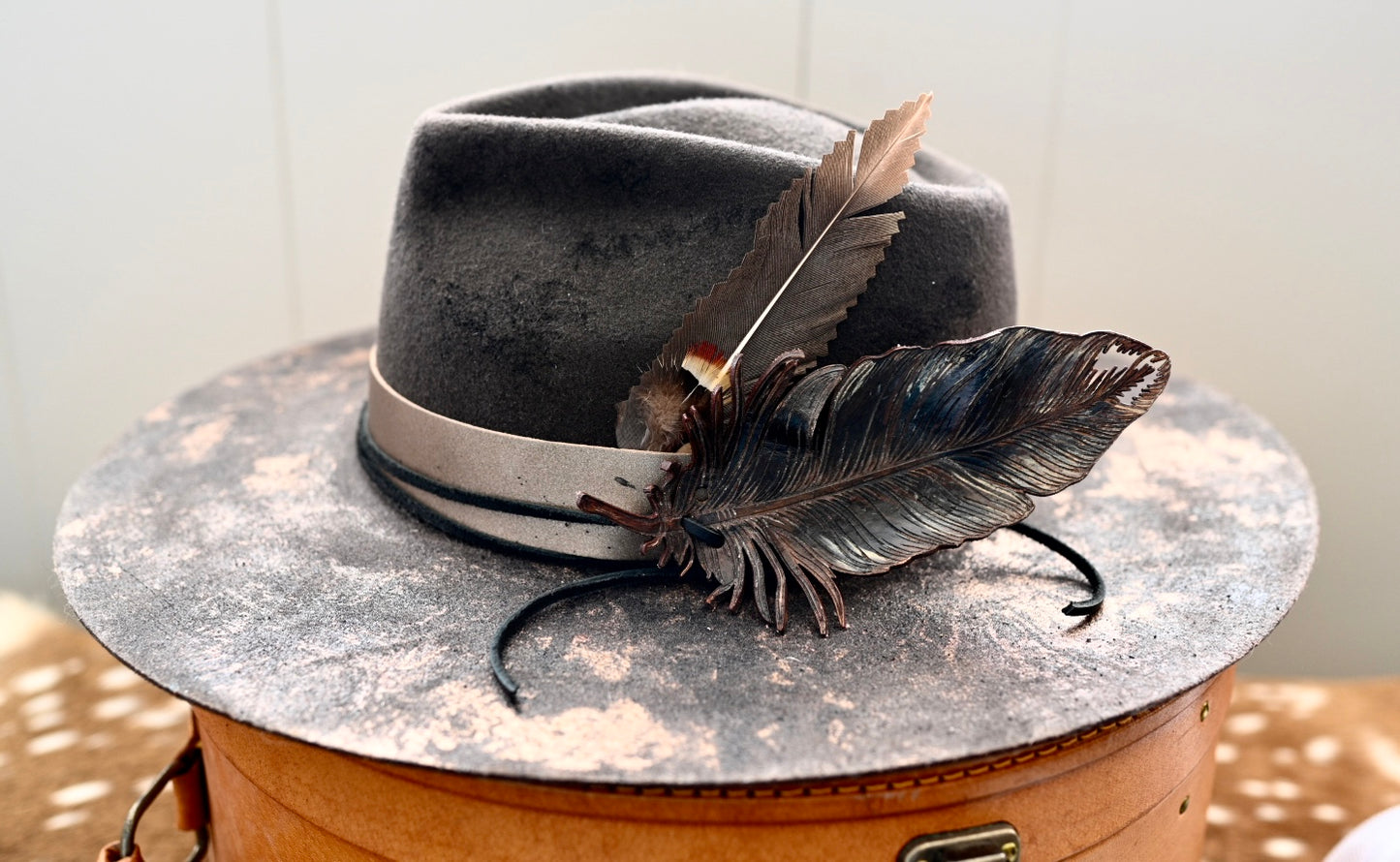 Wide brim fedora with custom leather feather