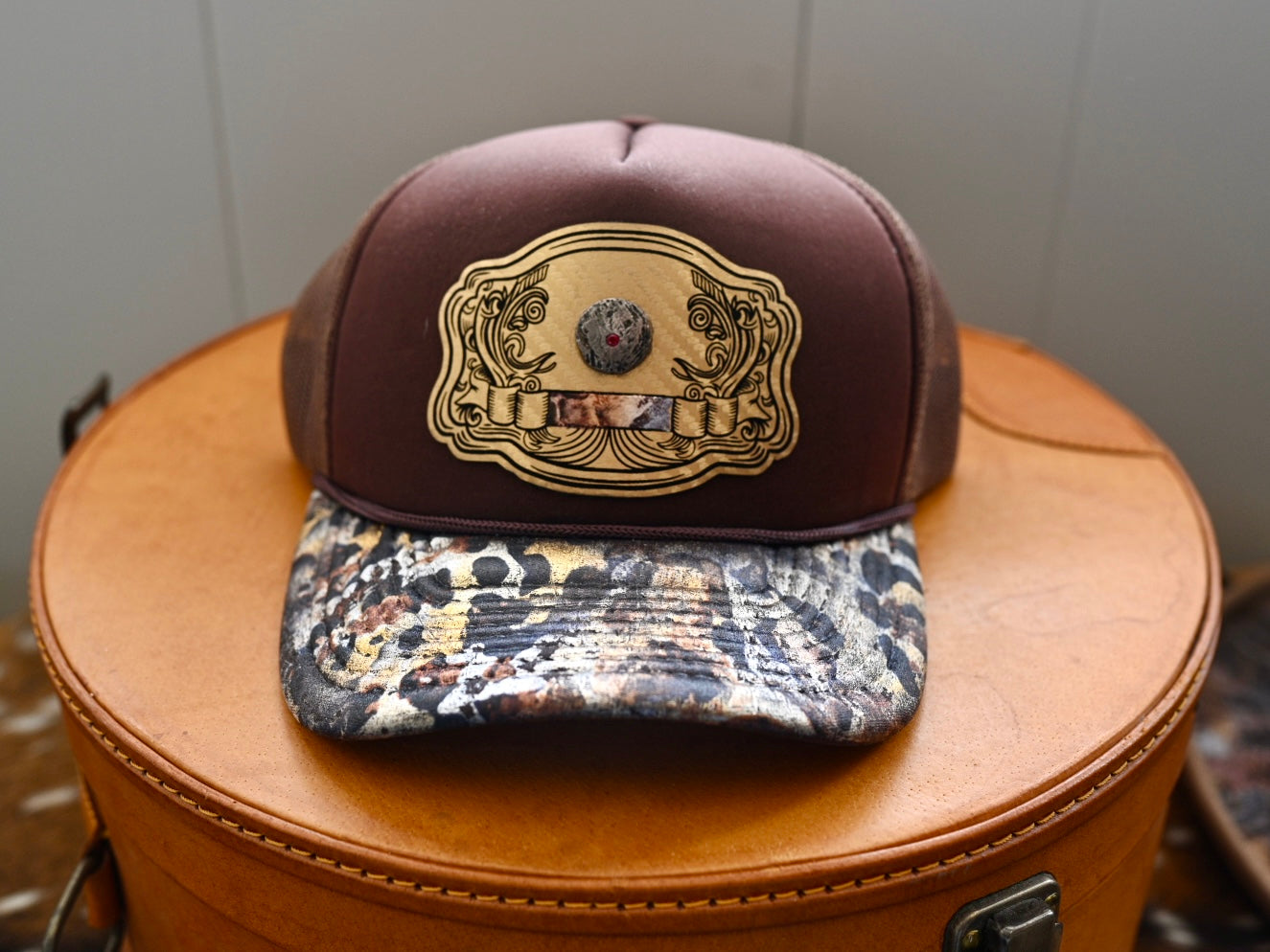 Buckle trucker with sterling button.