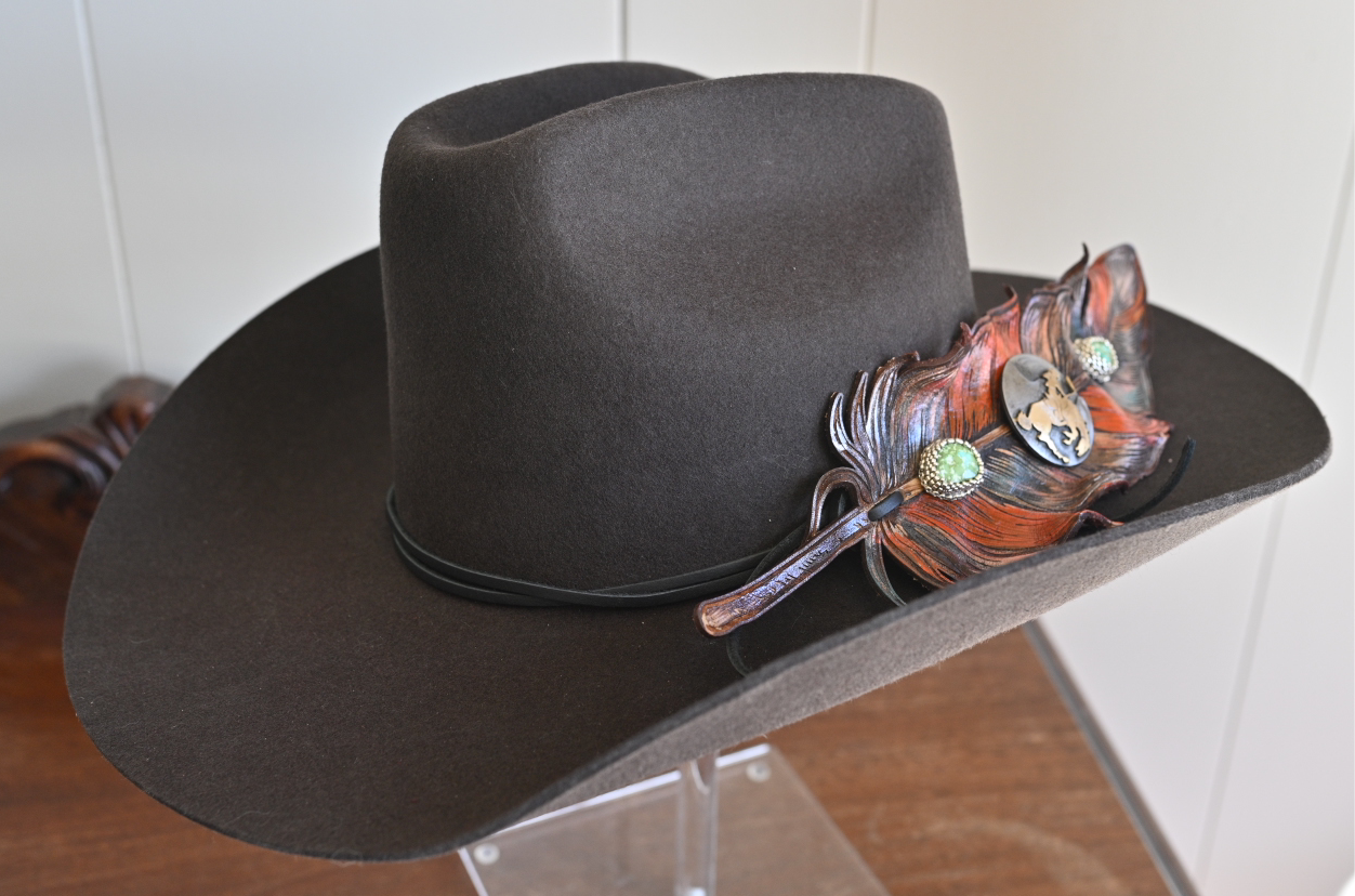 Broncho hat feather