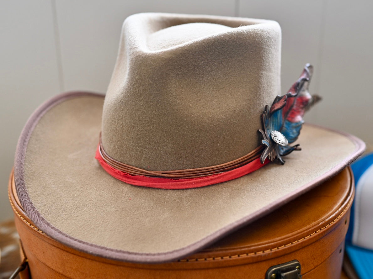June cowboy hat with custom feather