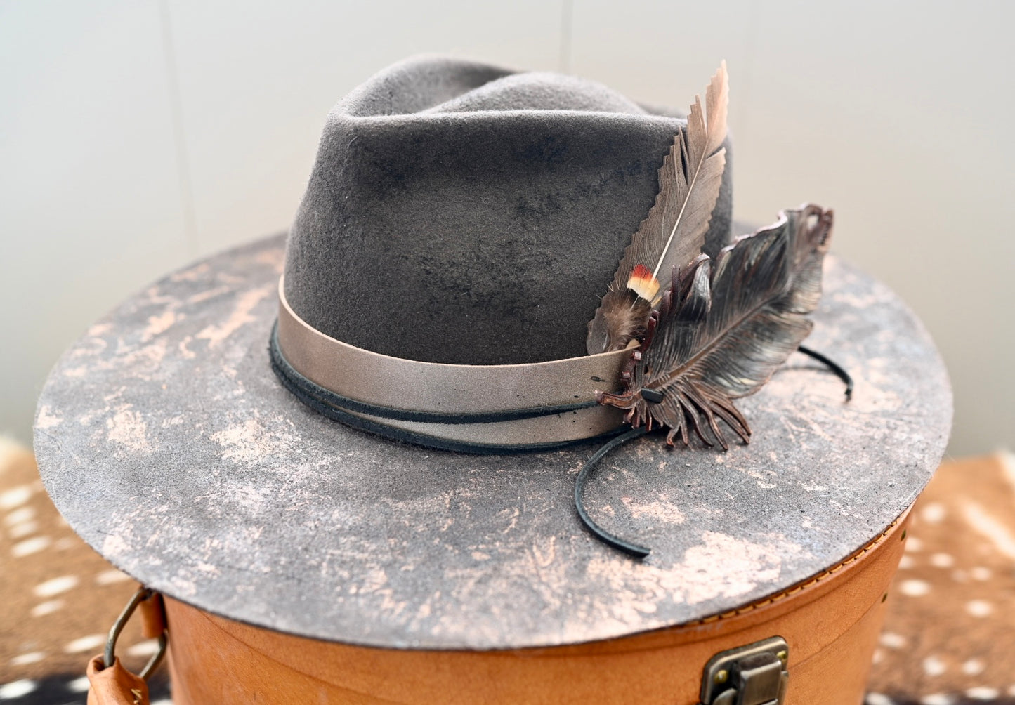 Wide brim fedora with custom leather feather